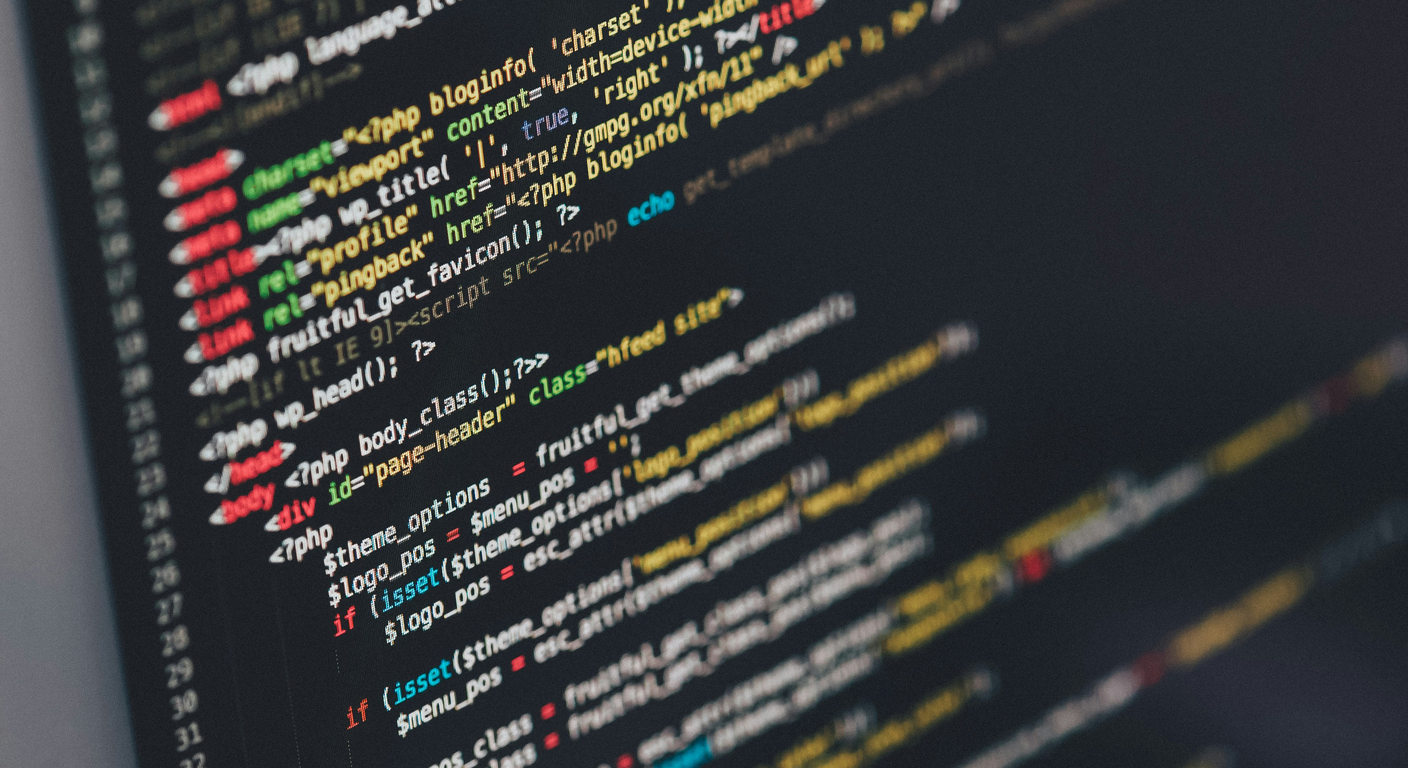 Close view of source code on a computer monitor.